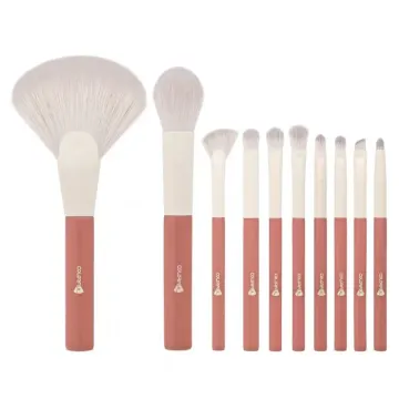 Orange makeup brush