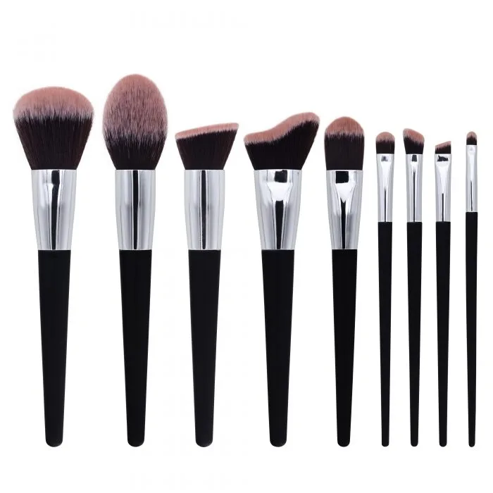 Orange and black makeup brush — view 1
