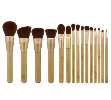 Makeup brush with brown wooden handle