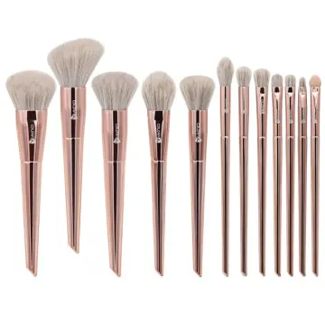 Light rose gold makeup brush