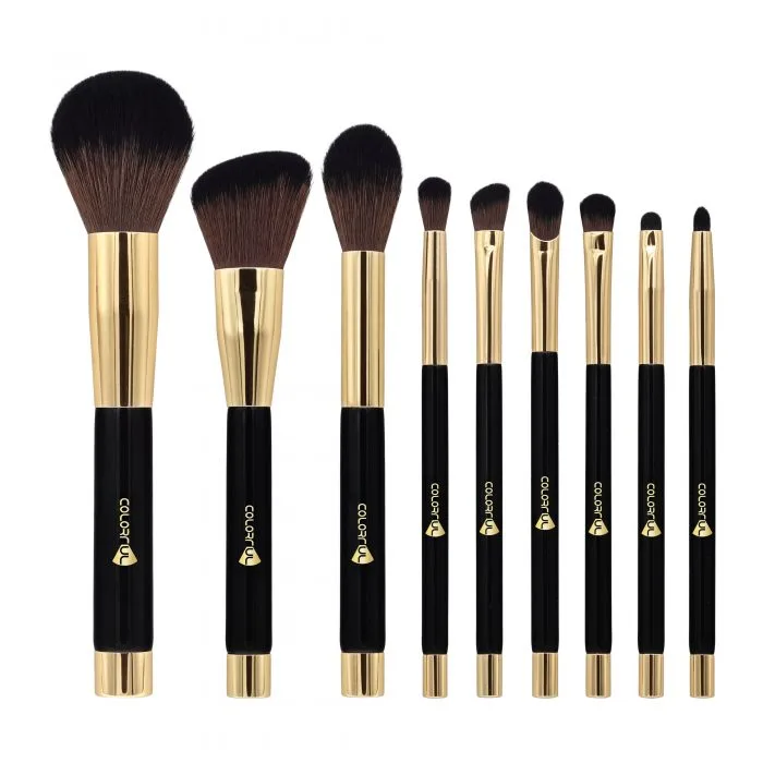 Black and gold makeup brush — view 1